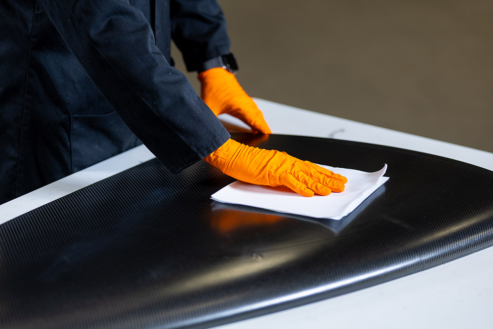 Graphene material being applied to a composite surface